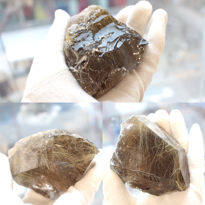 原石 ブラジル産 スモーキーゴールデンルチルクォーツ（天然石 パワーストーン）を手の平にのせて撮影